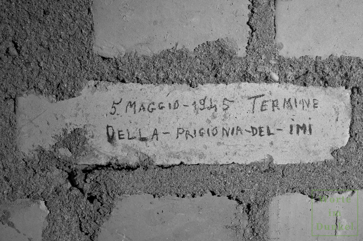 Beschriftung in einem Luftschutzstollen: "5. maggio 1945 Termine Della Prigionia del IMI"